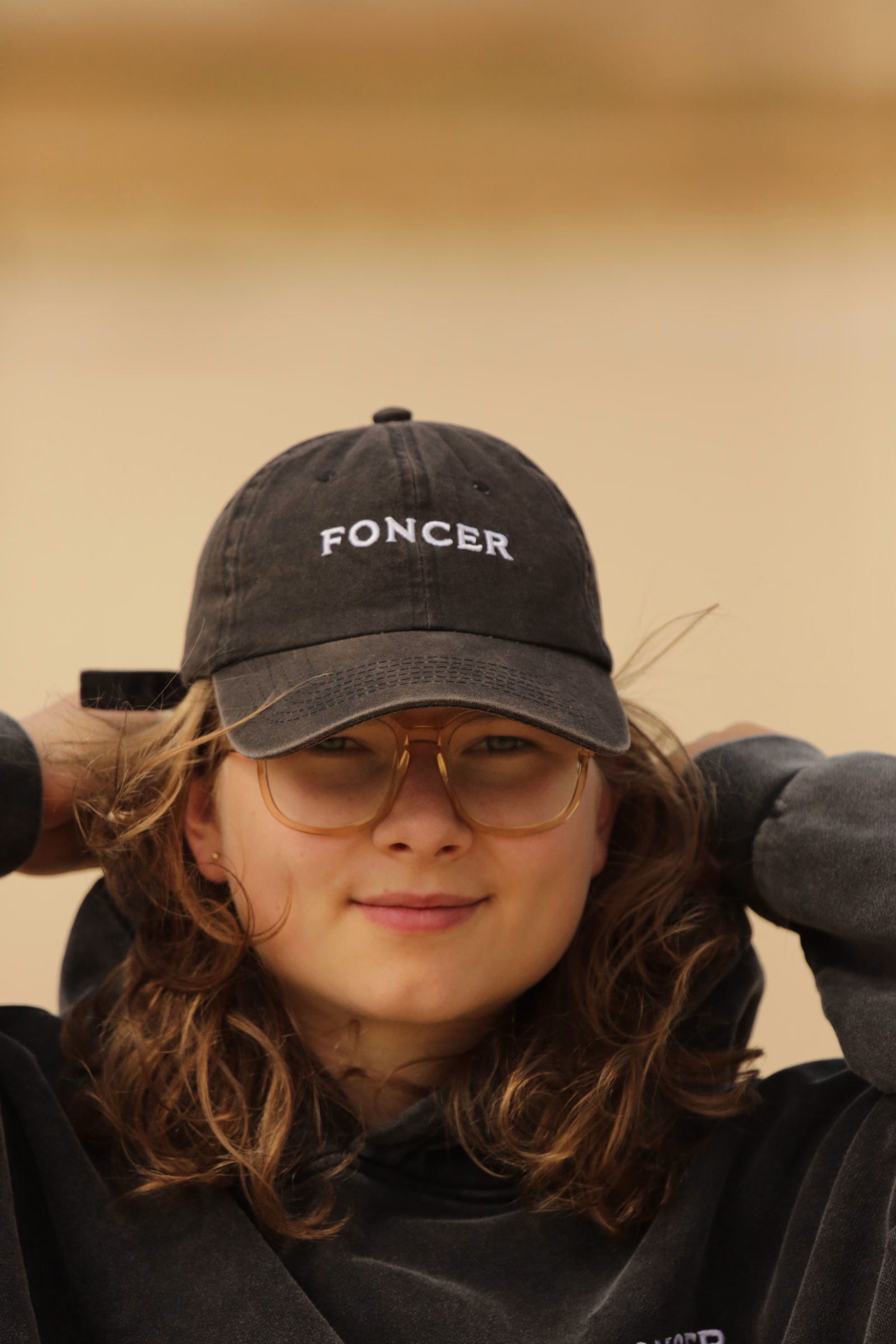 L'INITIAL cap